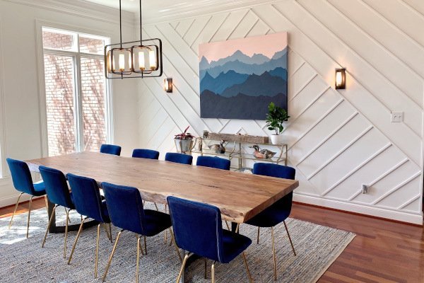 HSC dining room with blue layered mountain artwork above a console